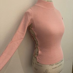 Brand new turtleneck open side long sleeve top